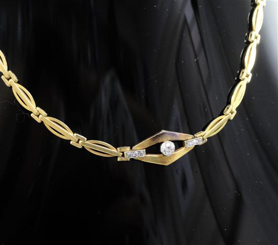 An early-mid 20th century Dutch 14ct? gold and diamond set long necklace, 41.5cm.